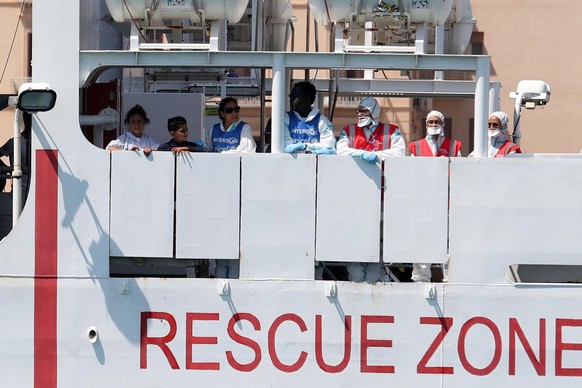 epa06883666 Italian Coast Guard ship Diciotti with 67 migrants on board enters the port of Trapani, Sicily, Italy, 12 July 2018. According to reports, the migrants were rescued by a civilian ship, the ...