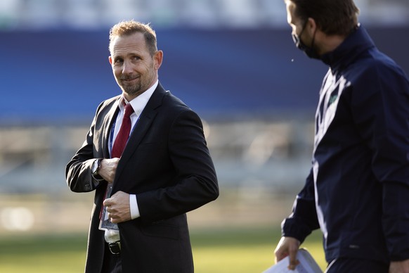 Switzerland&#039;s head coach Mauro Lustrinelli, left, and goalkeeper coach Swen Koenig, after the group stage group D match between England and Switzerland at the UEFA European Under 21 Championship, ...