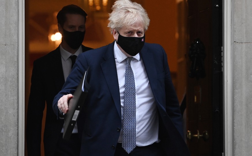 epa09708049 British Prime Minister Boris Johnson departs 10 Downing Street in London, Britain, 25 January 2022. British Prime Minister Boris Johnson is facing increased pressure following further lock ...