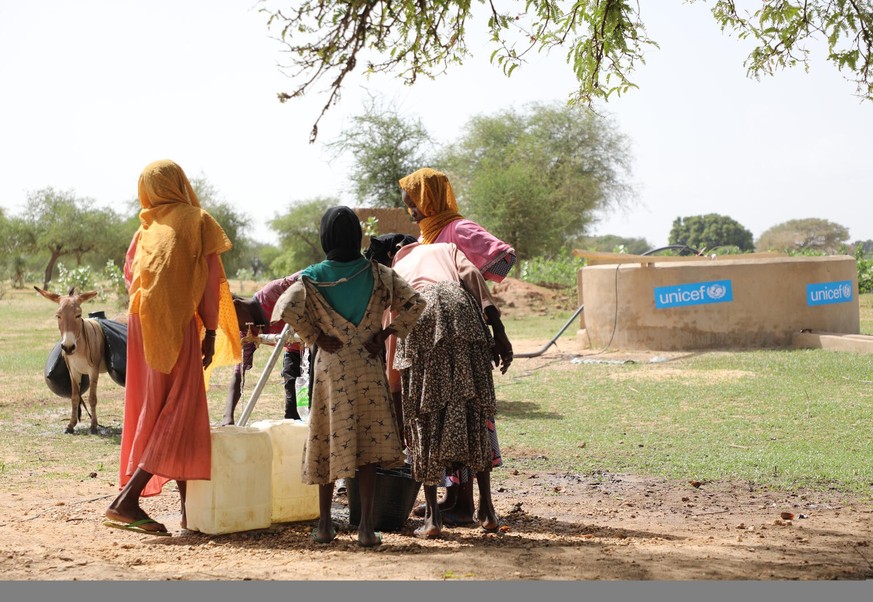 On 16 June 2023, women and girls are fetching water from a UNICEF-installed borehole in the village of Koufroun in eastern Chad, on the border with Sudan. Koufroun is home to thousands of Sudanese ref ...