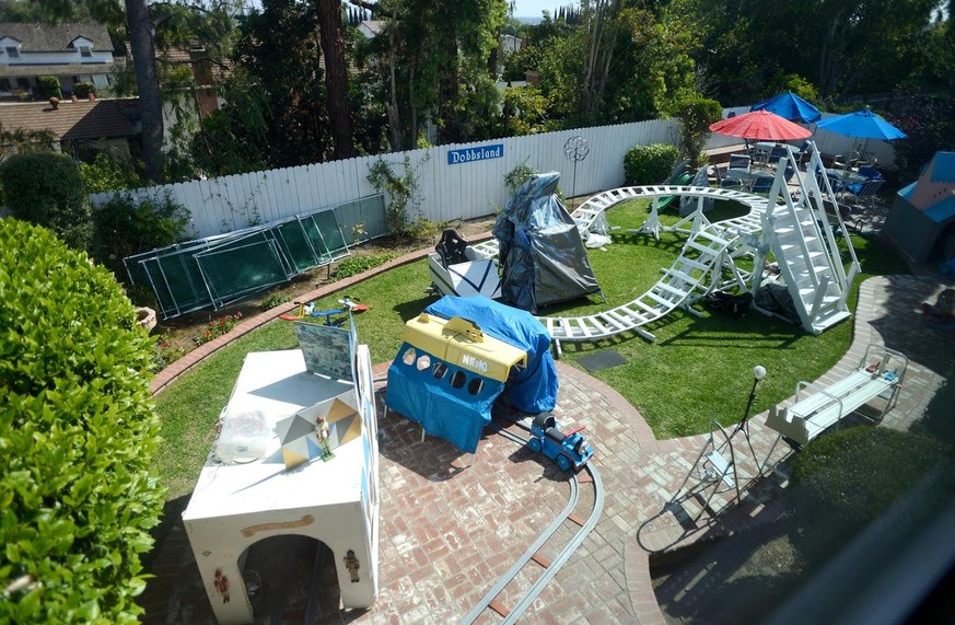 Steve Dobbs, a former Boeing aerospace engineer, built Disney-inspired rides in his Fullerton backyard including an adult-sized roller coaster. He calls the collection of rides, Dobbsland.///ADDITIO ...