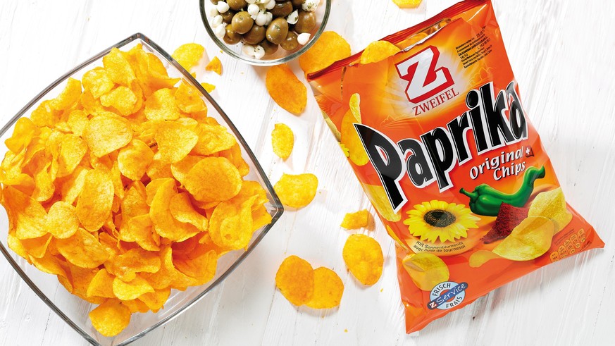 Seit 1964 die beliebtesten Chips im Sortiment: Zweifel Original Paprika Chips. Les meilleurs chips dans l&#039;assortiment depuis 1964: Zweifel Original Paprika Chips. Copyright: ARD Design Switzerlan ...