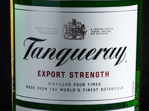Minsk, Belarus - 31-07-2022: a bottle of Tanqueray export strength London dry gin on dark background