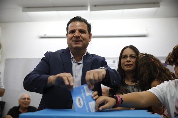FILE - In this Tuesday, Sept. 17, 2019. file photo, Israeli Arab politician Ayman Odeh casts his vote in Haifa, Israel. IsraelÄôs Arab coalition appears poised to emerge as the main opposition bloc f ...