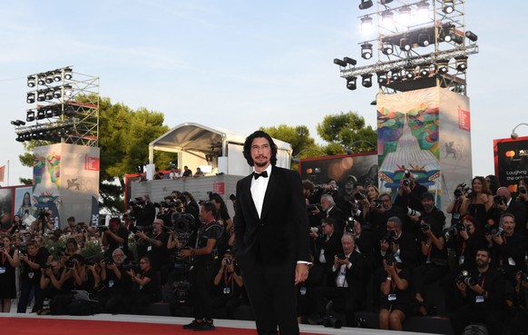 epa10831574 American actor Adam Driver arrives for the screening of 'Ferrari' at the 80th Annual Venice International Film Festival, in Venice, Italy, August 31, 2023. The film will be presented in…