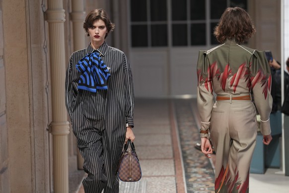 Models wear creations as part of the Louis Vuitton Fall/Winter 2025-2026 Womenswear collection presented in Paris, Monday, March 10, 2025. (Photo by Scott A Garfitt/Invision/AP)
France Fashion Louis V ...