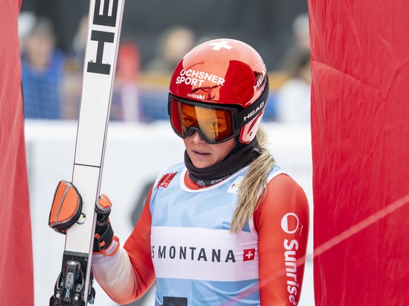 Corinne Suter of Switzerland reacts in the finish area after a training session for the women's Downhill race at the Alpine Skiing FIS Ski World Cup, in Crans-Montana, Switzerland, Wednesday, Jan ...