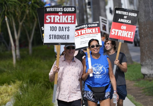 Picketers demonstrate outside Netflix studios on Wednesday, Aug. 9, 2023, in Los Angeles. The Hollywood writers strike reached the 100-day mark today as the U.S. film and television industries remain  ...