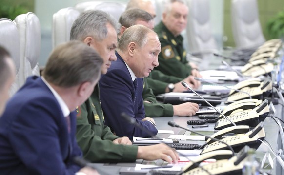 December 26, 2018. - Russia, Moscow. - Russian President Vladimir Putin watches the launch of the Avangard missile with hypersonic gliding cruise bloc at the National Defense Control Center via a vide ...
