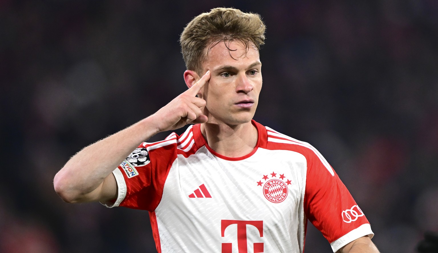 Bayern&#039;s Joshua Kimmich celebrates after scoring his side&#039;s opening goal during the Champions League quarter final second leg soccer match between Bayern Munich and Arsenal at the Allianz Ar ...