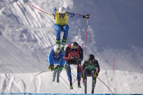 Switzerland&#039;s Alex Fiva leads the pack, followed by Sergey Ridzik, of the Russian Olympic Committee, Italy&#039;s Simone Deromedis and Canada&#039;s Brady Leman, competes during the men&#039;s cr ...