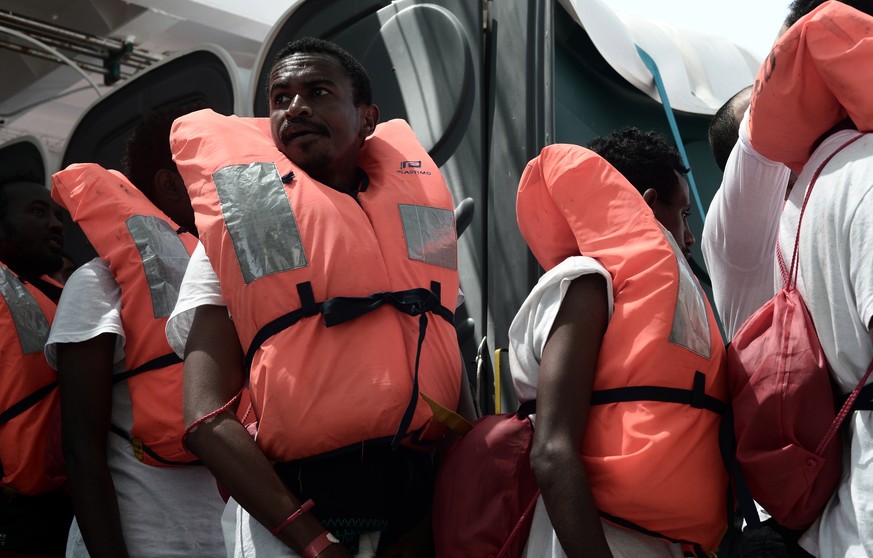 epa06802821 A handout photo made available by NGO &#039;SOS Mediterranee&#039; on 12 June 2018 shows some of the 629 migrants boarding rescue vessel &#039;Aqarius&#039; in the Mediterranean. The rescu ...