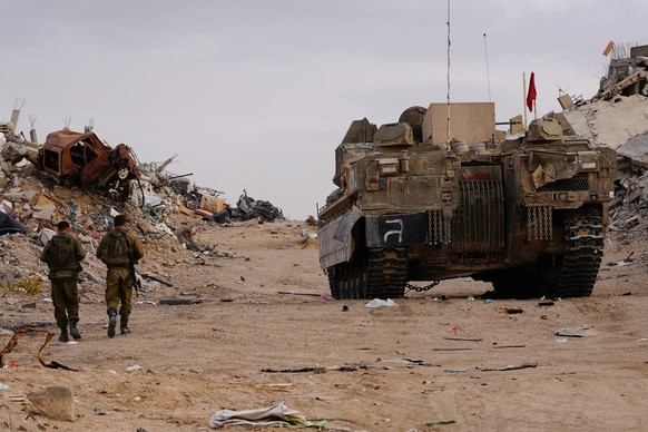 Israeli soldiers stand near the entrance of a tunnel where the army says the body of soldier Hadar Goldin was held in Rafah, Gaza Strip, Monday, Dec. 8, 2025. Hamas returned his remains to Israel as p ...