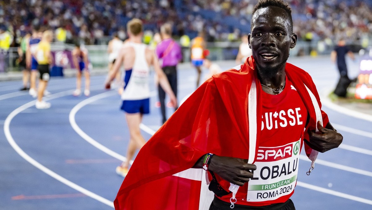 Bronze medalist Dominic Lobalu of Switzerland celebrates during the men's 5000 meters final at the European Athletics Championships, in the Olympic stadium, in Rome, Italy, Saturday, June 8, 2024 ...