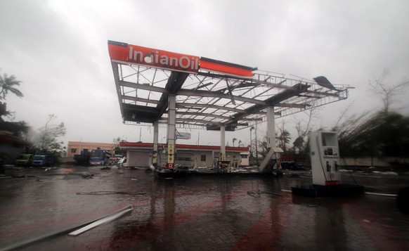 epa07544212 A damaged petrol station after cyclone Fani made landfall in Odisha coast, at Konark in Puri district Odisha, India 03 May 2019. According to news reports Cyclone Fani made landfall in Pur ...