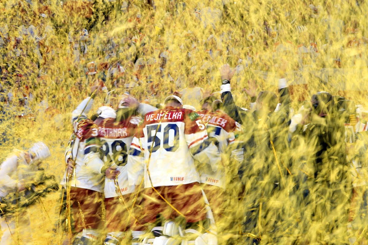 Members of the Czech Republic team celebrate with their trophy after they defeated Switzerland 2-0 in a gold medal match between Czech Republic and Switzerland at the Ice Hockey World Championships in ...