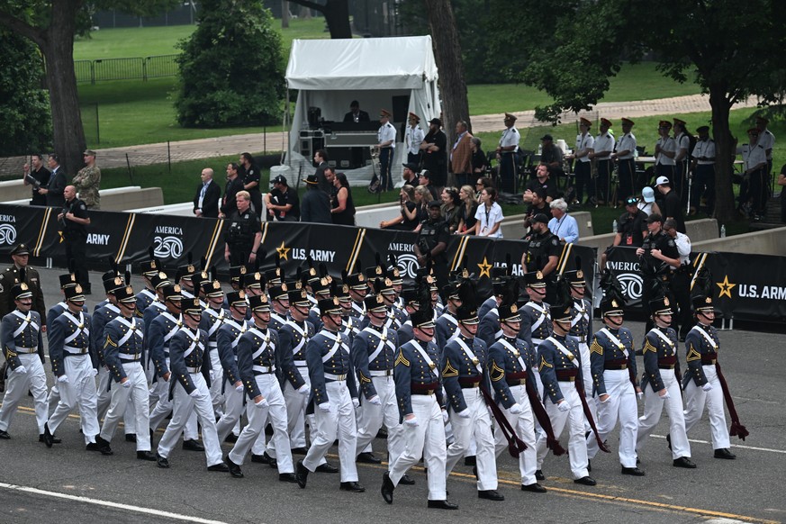epa12176227 Military members march during the US Army's 250th Anniversary Parade in Washington, DC, USA, 14 June 2025. The parade, which happens to coincide with US President Donald Trump?s 79th ...