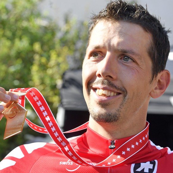 Der Walliser Steve Morabito gewinnt die Rad-Schweizermeistersterschaft in Schneisingen (ZH) am Sonntag, 1. Juli 2018. (KEYSTONE/Walter Bieri)