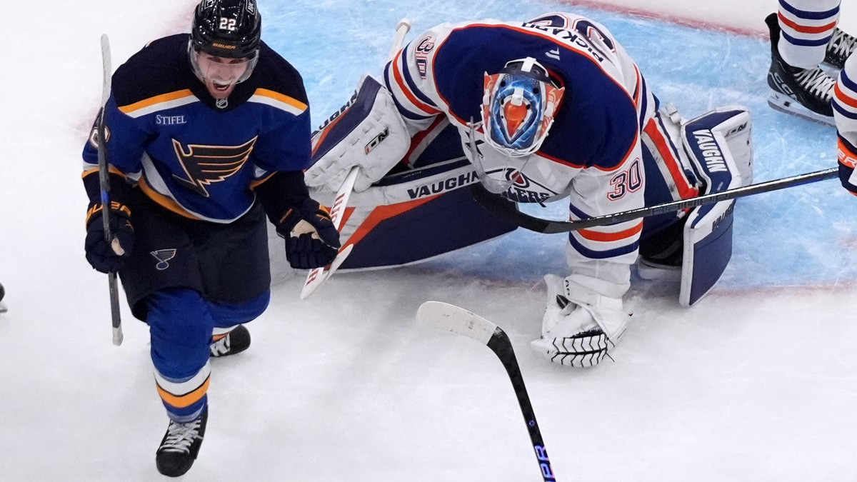St. Louis Blues' Pius Suter, left, celebrates after scoring the game-winning goal past Edmonton Oilers goaltender Calvin Pickard (30) during the third period of an NHL hockey game Monday, Nov. 3, ...