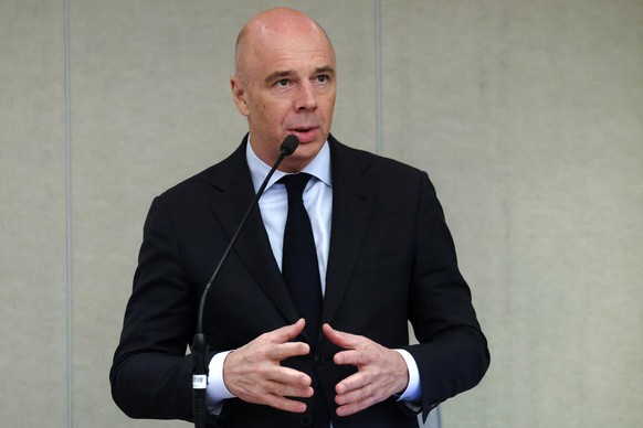 In this photo provided by The State Duma, The Lower House of the Russian Parliament Press Service, Russian Finance Minister Anton Siluanov attends a session at the State Duma, the lower house of the R ...