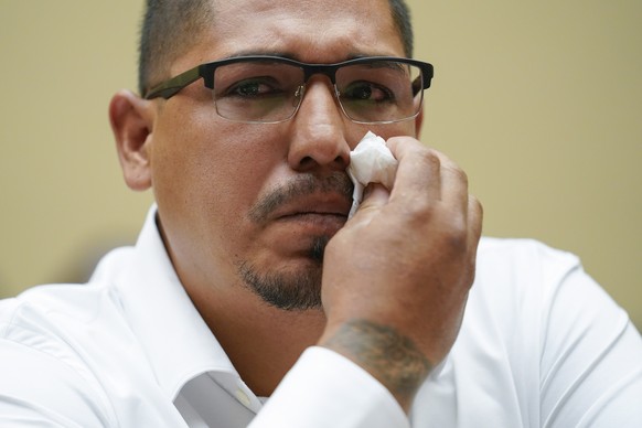 epa10002343 Miguel� Cerrillo, father of Miah Cerrillo a fourth grade student at Robb Elementary School in Uvalde, Texas, tears up as he testifies during a House Committee on Oversight and Reform heari ...