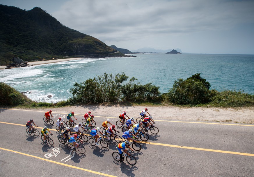 In this photo released by the IOC, cyclists compete in the men&#039;s road cycling race C4-5, during the Paralympic Games in Rio de Janeiro, Brazil, Saturday, Sept. 17, 2016. (Simon Bruty/OIS, IOC via ...