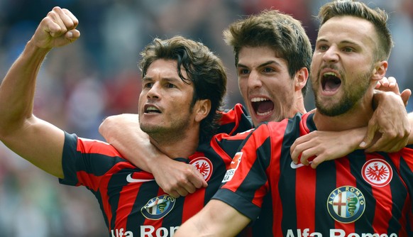 epa04364839 Frankfurt's Nelson Valdez (L-R), Lucas Piazon and goalscorer Haris Seferovic celebrate the 1-0 goal during the German Bundesliga match between Eintracht Frankfurt and SC Freiburg at C ...