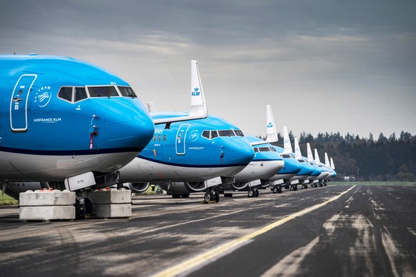 epa08809864 Twelve KLM passenger planes are grounded for the winter at Groningen Airport Eelde, the Netherlands, 09 November 2020. EPA/SIESE VEENSTRA