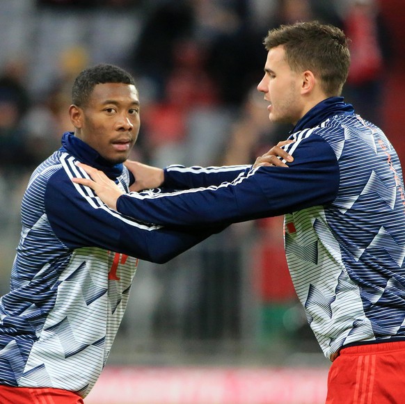 24.02.2020, FC Bayern vs SC Paderborn, Allianz Arena Muenchen, Fussball, im Bild: David Alaba FCB und Lucas Hernandez FCB *** 24 02 2020, FC Bayern vs SC Paderborn, Allianz Arena Munich, football, spo ...