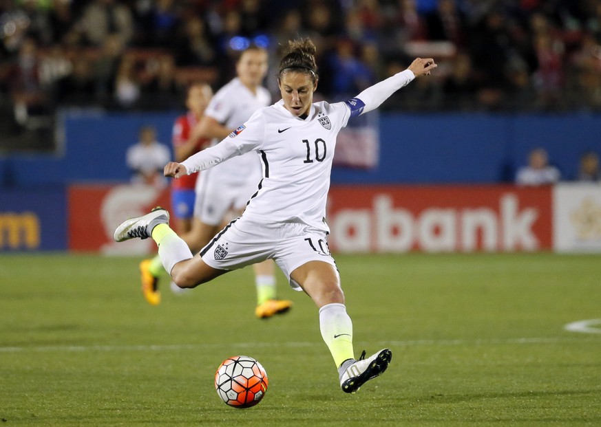FILE - In this Feb. 10, 2016, file photo, United States&#039; Carli Lloyd takes a shot at the Costa Rica goal during a CONCACAF Olympic qualifying tournament soccer match in Frisco, Texas. After being ...