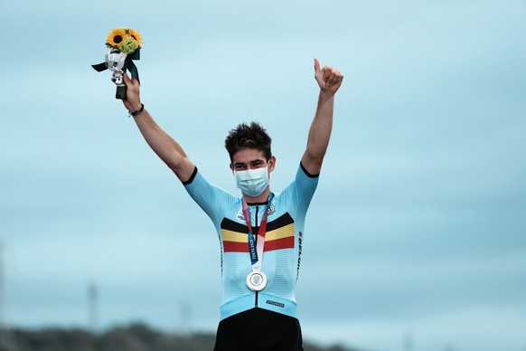 Wout van Aert of Belgium who won the silver medal, reacts during a medal ceremony after the men&#039;s cycling road race at the 2020 Summer Olympics, Saturday, July 24, 2021, in Oyama, Japan. (AP Phot ...