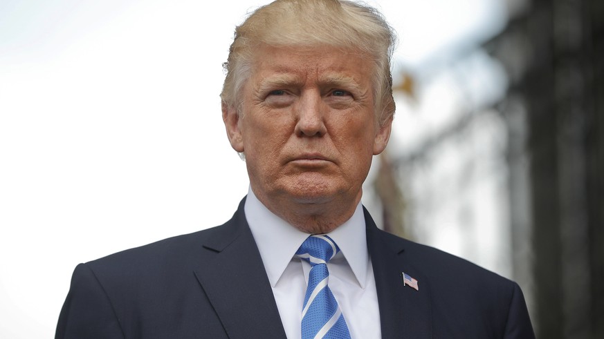 President Donald Trump listen to a question from a reporter following his meeting with Secretary of State Rex Tillerson, U.S. Ambassador to the United Nations Nikki Haley and national security adviser ...