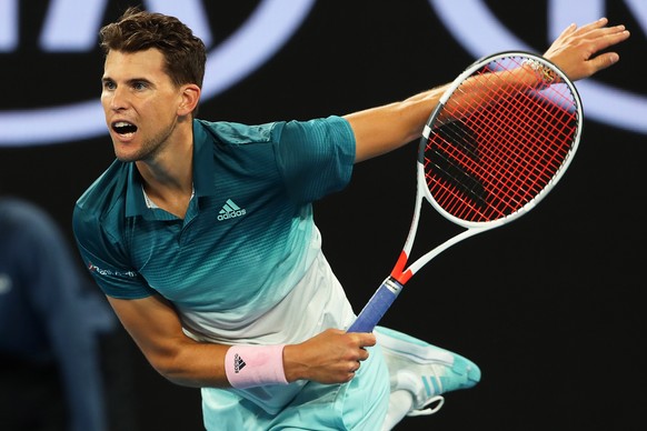 epa07292047 Dominic Thiem of Austria in action against Alexei Popyrin of Australia during their men&#039;s second round match of the Australian Open Grand Slam tennis tournament in Melbourne, Australi ...