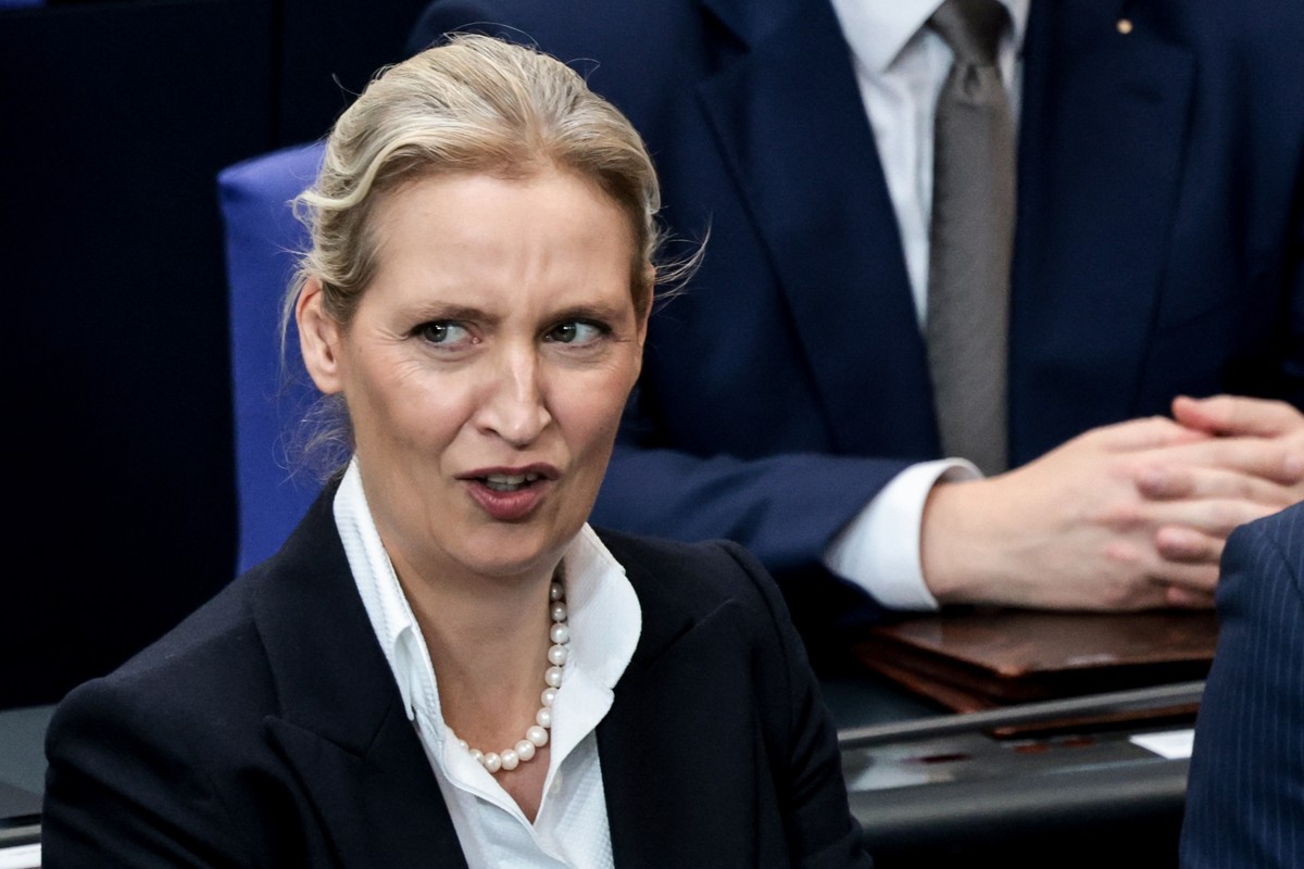 epa13303420 Alternative for Germany (AfD) party and faction co-chairwoman Alice Weidel reacts during a session of the German parliament, the Bundestag, to deliver a government statement in Berlin, Ger ...