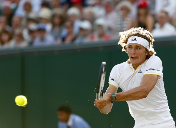 epa06079854 Alexander Zverev of Germany in action against Milos Raonic of Canada during their fourth round match for the Wimbledon Championships at the All England Lawn Tennis Club, in London, Britain ...