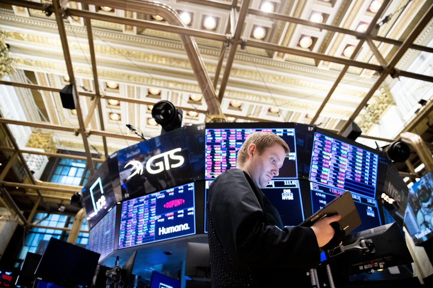 FILE - Traders work on the floor of the New York Stock Exchange on Tuesday, Sept. 13, 2022. A rare bear market in bonds hasn���t gotten much attention, but it may be inflicting more pain on investors  ...