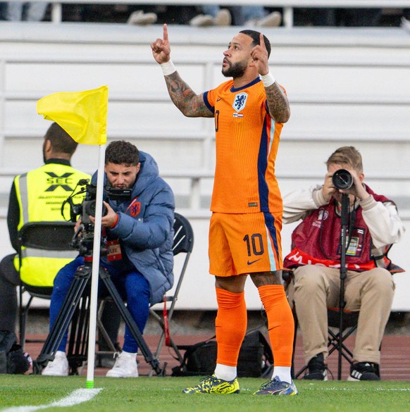 epa12162894 Memphis Depay (C) of Netherlands reacts during the FIFA World Cup 2026 qualifier soccer match between Finland and Netherlands, in Helsinki, Finland, 07 June 2025. EPA/JUSSI ESKOLA