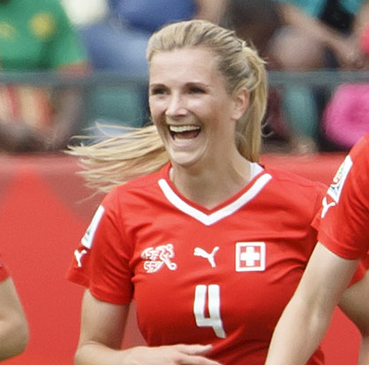Switzerland's Ana Maria Crnogorcevic, 2nd right, celebrates her goal in front of temmates Fabienne Humm, left, Rachel Rinast, 2nd left, and Martina Moser, right, after scored the 1:0, during the  ...