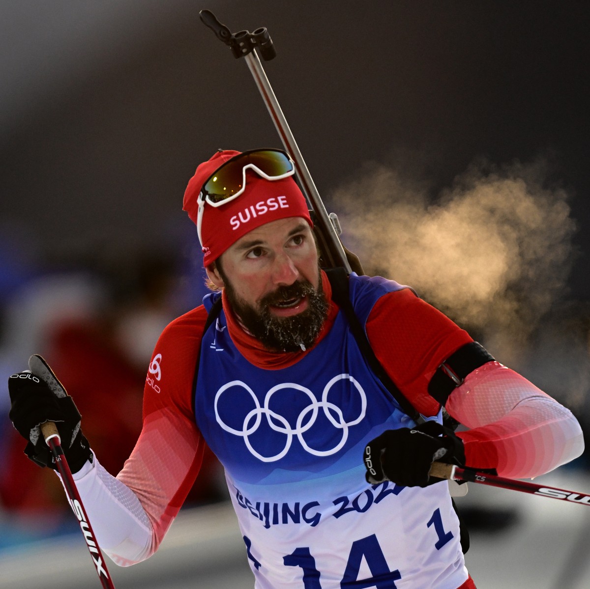 epa09748896 Benjamin Weger of Switzerland in action during the Men's Biathlon 10km Sprint race at the Zhangjiakou National Biathlon Centre at the Beijing 2022 Olympic Games, Zhangjiakou, China, 1 ...