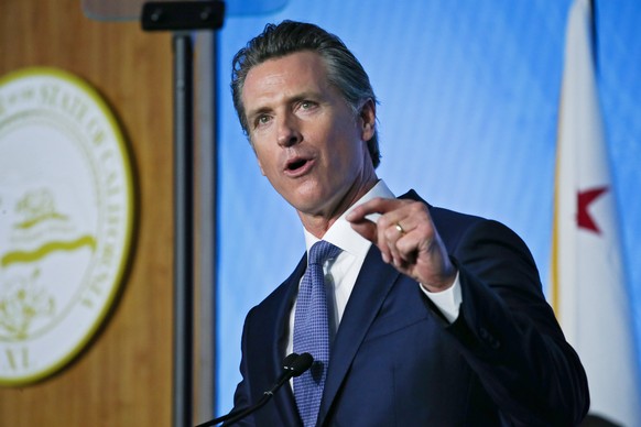 epa07268400 California Governor Gavin Newsom gives his inauguration address after being sworn in at the State Capitol in Sacramento, California, USA, 07 January 2019. The Democrat Gavin Newsom has bee ...