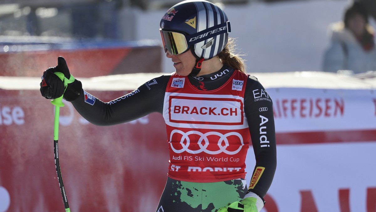 Italy's Sofia Goggia reacts after crossing the finish line to complete an alpine ski, women's World Cup downhill race, in St. Moritz, Switzerland, Saturday, Dec. 17, 2022. (AP Photo/Marco Tr ...