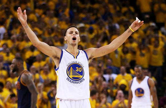 OAKLAND, CA - JUNE 04: Stephen Curry #30 of the Golden State Warriors reacts in overtime against the Cleveland Cavaliers during Game One of the 2015 NBA Finals at ORACLE Arena on June 4, 2015 in Oakla ...