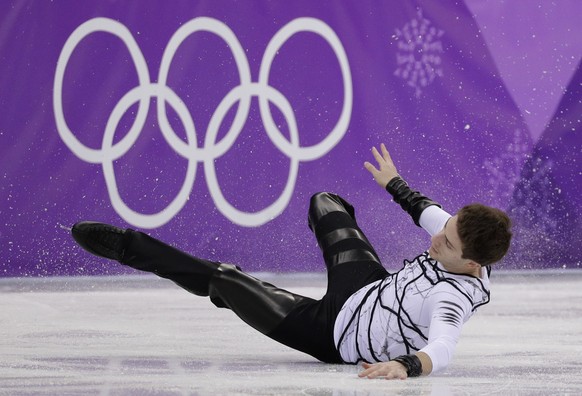 Morisi Kvitelashvili of Georgia falls while performing in the men&#039;s free figure skating final in the Gangneung Ice Arena at the 2018 Winter Olympics in Gangneung, South Korea, Saturday, Feb. 17,  ...