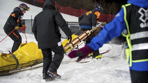 Iouri Podladtchikov gets carted after he crashed during his second run in the men&#039;s superpipe finals at the Winter X Games on Sunday, Jan. 28, 2018, in Aspen, Colo. The Olympic champion snowboard ...