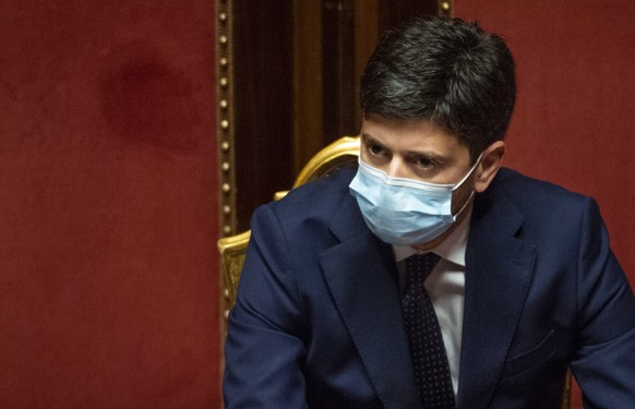 epa08723890 Italian Minister of Health Roberto Speranza wears a face mask at the Senate in an debate on the government&#039;s anti-Covid19 measures, in Rome, Italy, 06 October 2020. Speranza said the  ...