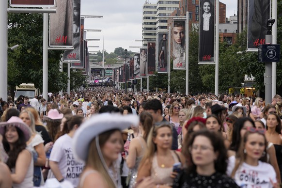 Fans of singer Taylor Swift, called Swifties, arrive at Wembley Stadium in London, Thursday, Aug. 15, 2024 for the first of five concerts of Taylor Swift&#039;s Eras Tour.(AP Photo/Alastair Grant)