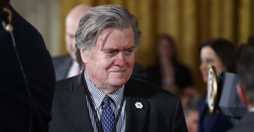 FILE - In this march 17, 2017 file photo, White House chief strategist Steve Bannon is seen in the East Room of the White House in Washington. Bannon will not face charges related to his registration  ...