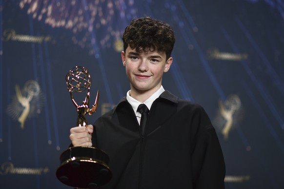 Owen Cooper, winner of the award for outstanding supporting actor in a limited or anthology series or movie for &quot;Adolescence,&quot; poses in the press room during the 77th Primetime Emmy Awards o ...