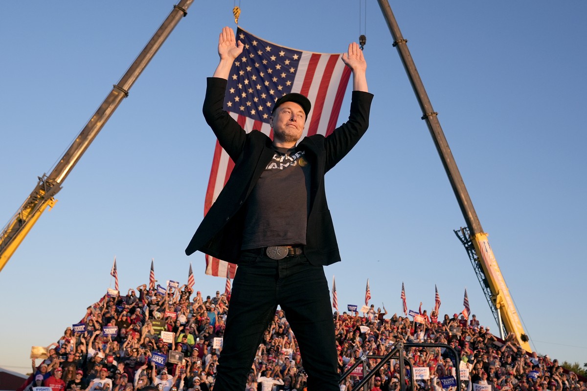 Tesla and SpaceX CEO Elon Musk walks to the stage to speak alongside Republican presidential nominee former President Donald Trump at a campaign event at the Butler Farm Show, Saturday, Oct. 5, 2024,  ...