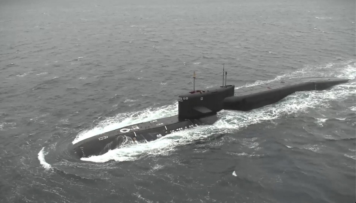 epa10267249 A handout still image taken from a handout video provided by the Russian Defence ministry press-service shows the Russian nuclear-powered submarine 'Tula' preparing to launch a & ...